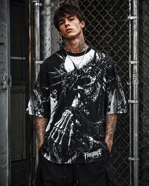 Model Alan wearing the black CALL OF THE BLACK VOID Shirt by Frostbite Apparel in a dark, underground streetwear aesthetic.