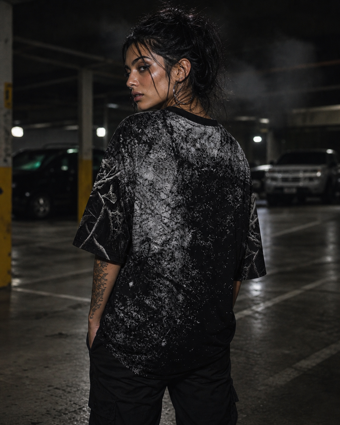Model Rebecca wearing the black NIHILIST Shirt by Frostbite Apparel in a dark underground streetwear aesthetic Backview